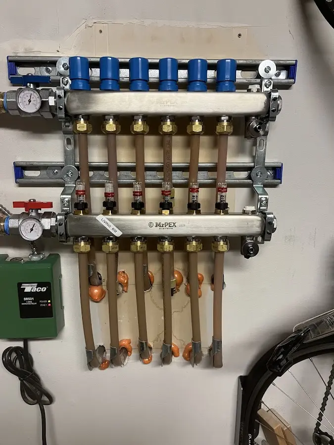 Plumber performing Gas Line Installation at a residential property in Liberty Lake